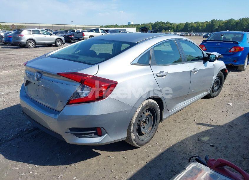 Photo 4 of 2018 Honda Civic LX (VIN 19XFC2F59JE011135)