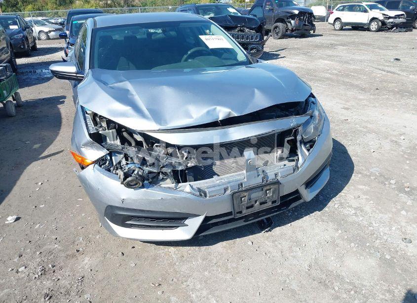 Photo 6 of 2018 Honda Civic LX (VIN 19XFC2F59JE011135)