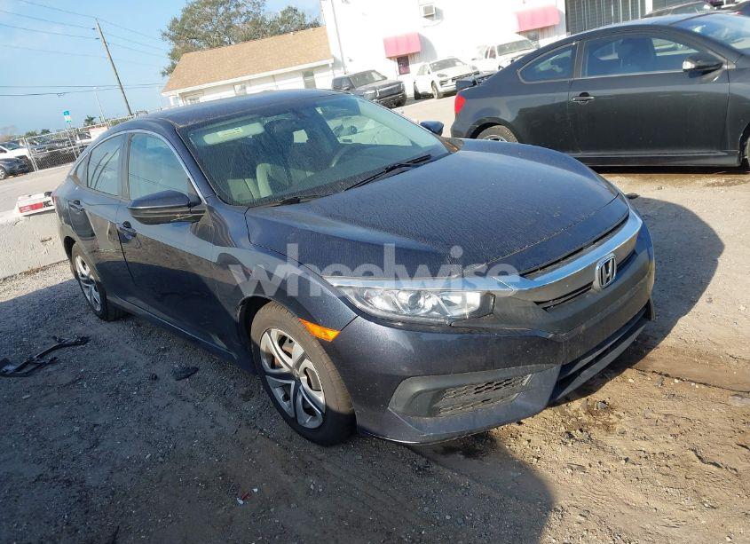 2018 Honda Civic LX (VIN 19XFC2F59JE024256) main photo