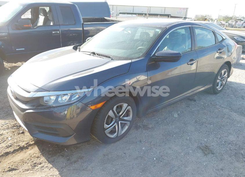 Photo 2 of 2018 Honda Civic LX (VIN 19XFC2F59JE024256)