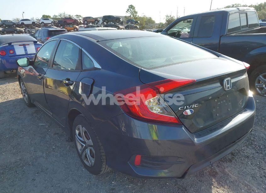 Photo 3 of 2018 Honda Civic LX (VIN 19XFC2F59JE024256)