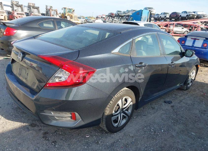 Photo 4 of 2018 Honda Civic LX (VIN 19XFC2F59JE024256)