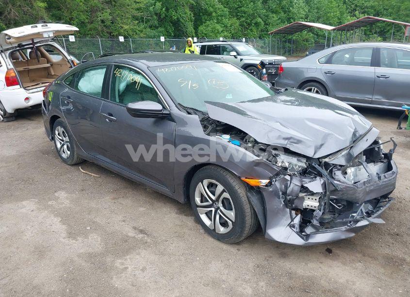 2018 Honda Civic LX (VIN 19XFC2F59JE043406) main photo