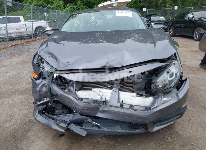 Photo 12 of 2018 Honda Civic LX (VIN 19XFC2F59JE043406)