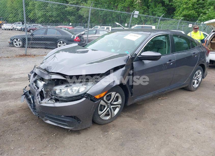 Photo 2 of 2018 Honda Civic LX (VIN 19XFC2F59JE043406)