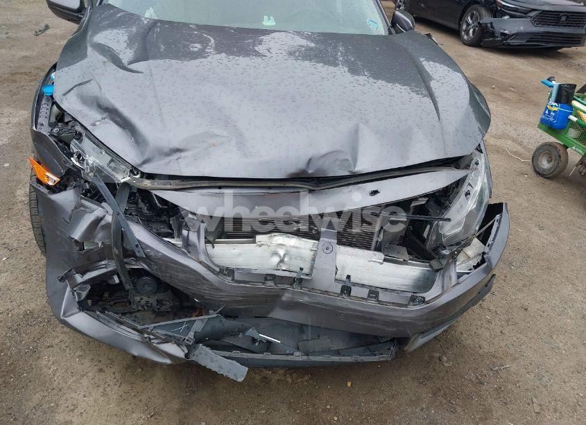 Photo 6 of 2018 Honda Civic LX (VIN 19XFC2F59JE043406)