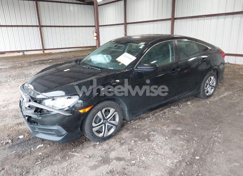 Photo 2 of 2017 Honda Civic LX (VIN 19XFC2F5XHE002003)
