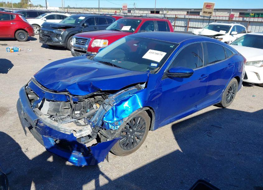 Photo 2 of 2017 Honda Civic LX (VIN 19XFC2F5XHE002101)