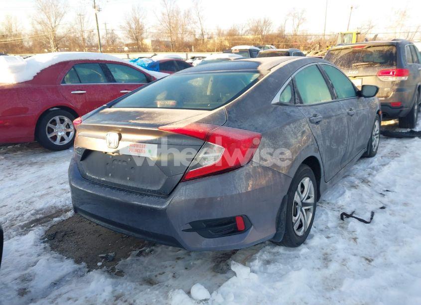 Photo 4 of 2017 Honda Civic LX (VIN 19XFC2F5XHE011249)