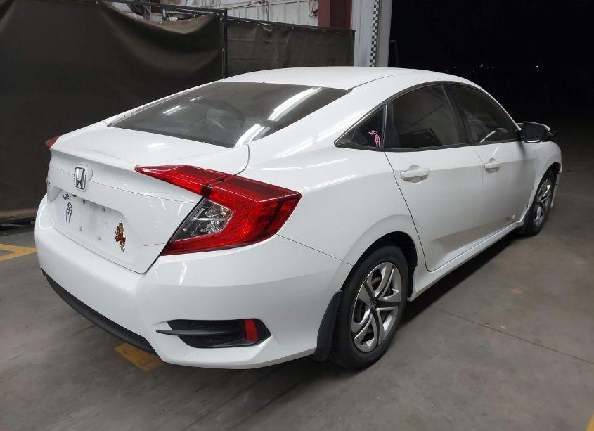 Photo 4 of 2017 Honda Civic LX (VIN 19XFC2F5XHE031341)