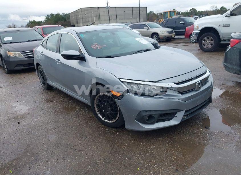 2017 Honda Civic LX (VIN 19XFC2F5XHE038810) main photo