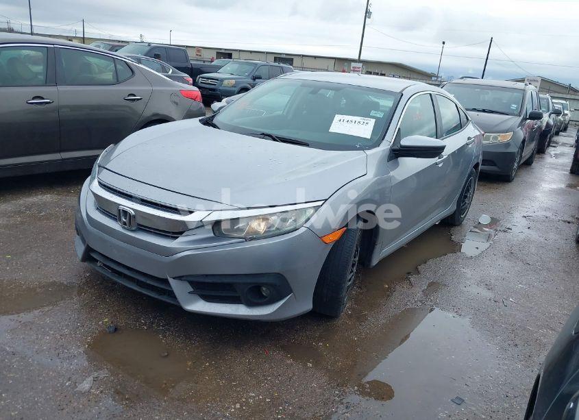 Photo 2 of 2017 Honda Civic LX (VIN 19XFC2F5XHE038810)