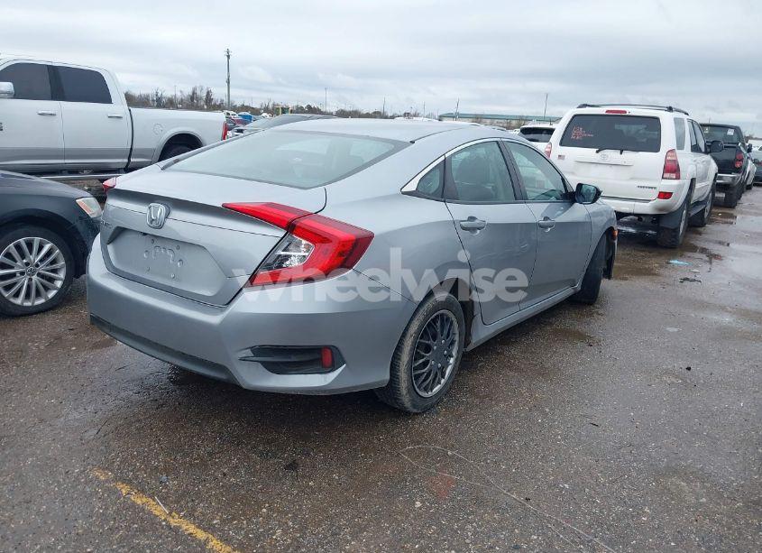 Photo 4 of 2017 Honda Civic LX (VIN 19XFC2F5XHE038810)