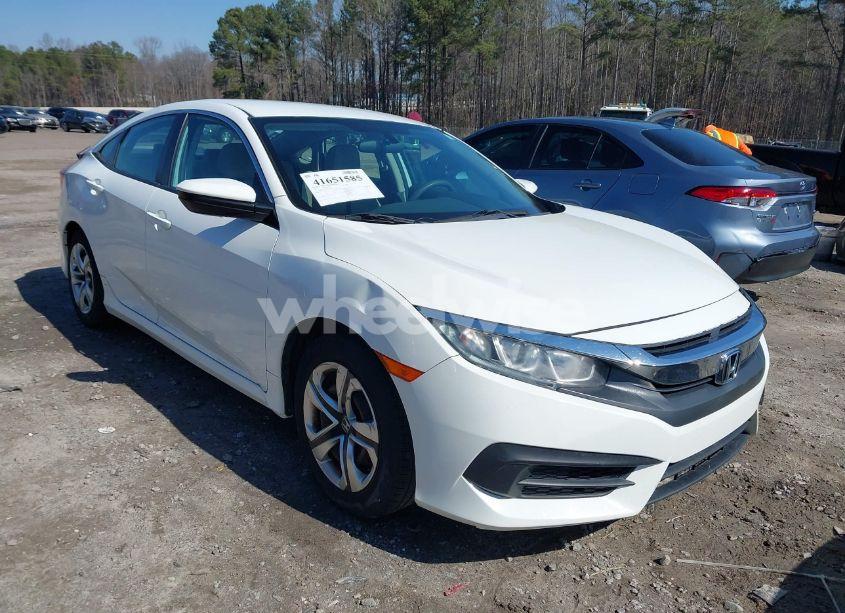 2017 Honda Civic LX (VIN 19XFC2F5XHE043571) main photo