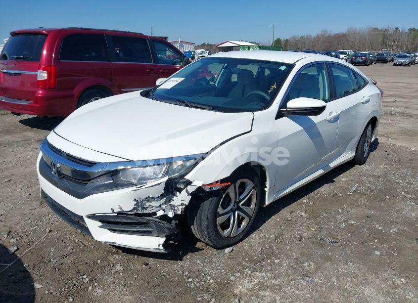 Photo 2 of 2017 Honda Civic LX (VIN 19XFC2F5XHE043571)