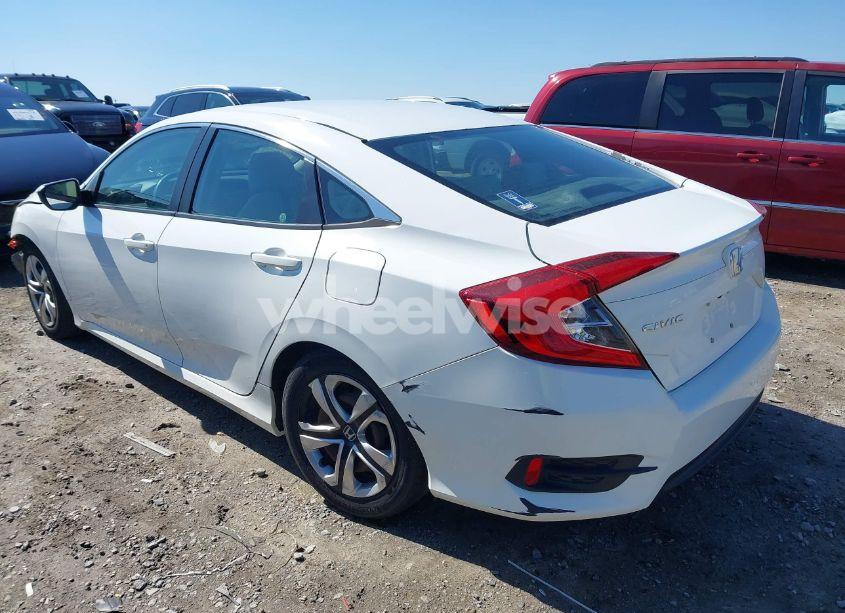Photo 3 of 2017 Honda Civic LX (VIN 19XFC2F5XHE043571)