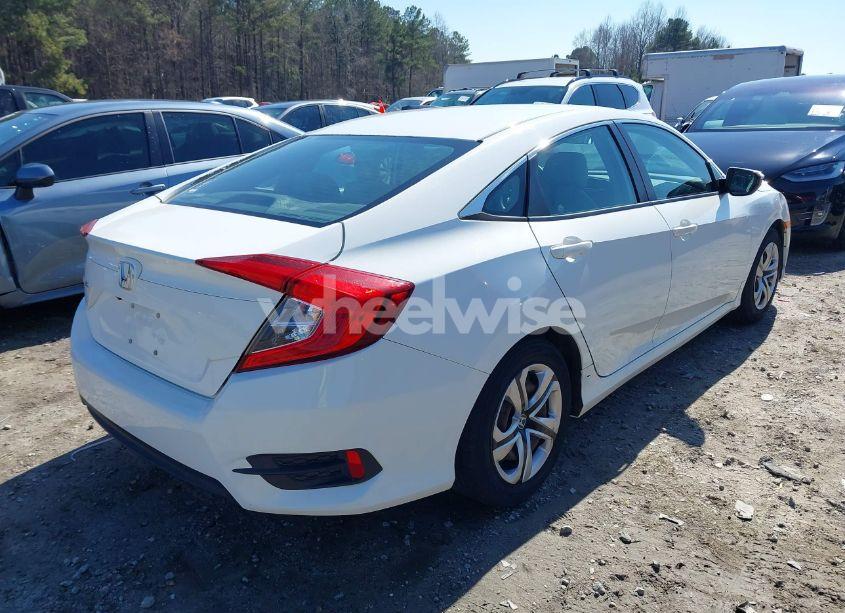 Photo 4 of 2017 Honda Civic LX (VIN 19XFC2F5XHE043571)