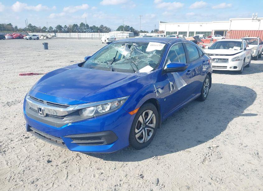 Photo 2 of 2017 Honda Civic LX (VIN 19XFC2F5XHE050651)