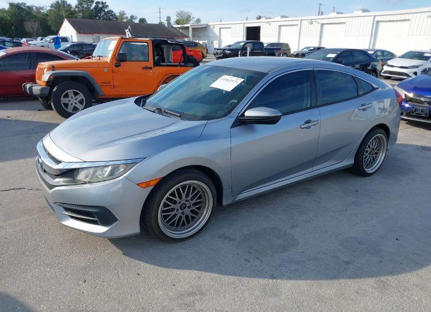 Photo 2 of 2017 Honda Civic LX (VIN 19XFC2F5XHE059088)