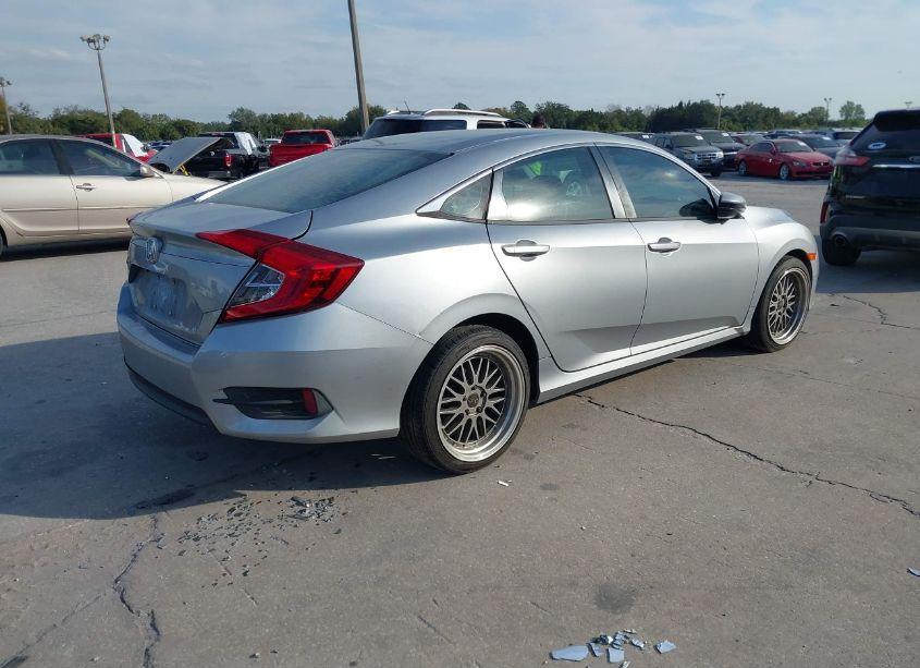Photo 4 of 2017 Honda Civic LX (VIN 19XFC2F5XHE059088)