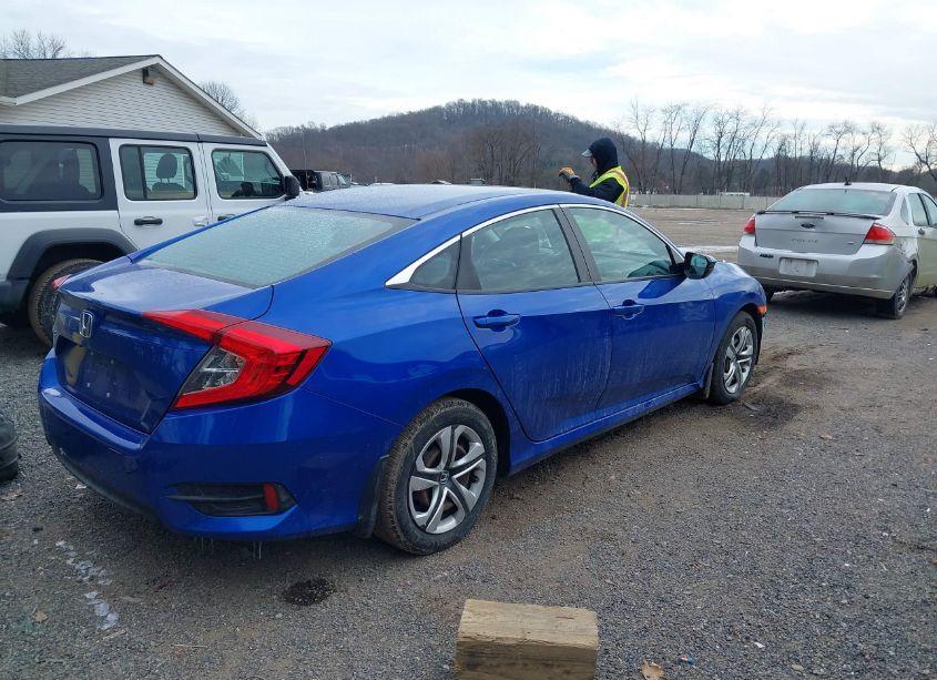 Photo 4 of 2017 Honda Civic LX (VIN 19XFC2F5XHE061648)