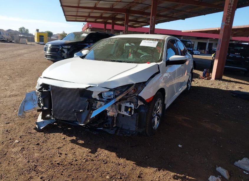 Photo 2 of 2017 Honda Civic LX (VIN 19XFC2F5XHE072634)