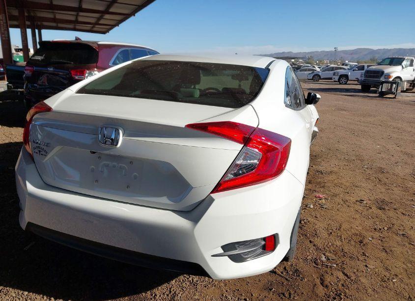 Photo 4 of 2017 Honda Civic LX (VIN 19XFC2F5XHE072634)