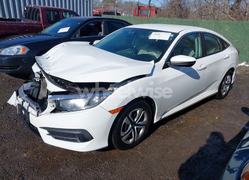 Photo 2 of 2017 Honda Civic LX (VIN 19XFC2F5XHE209197)