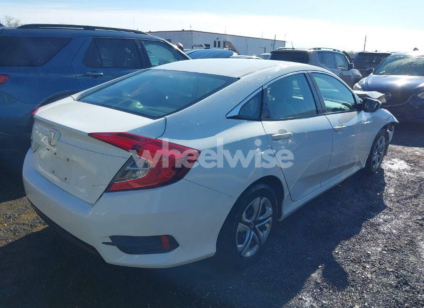 Photo 4 of 2017 Honda Civic LX (VIN 19XFC2F5XHE209197)