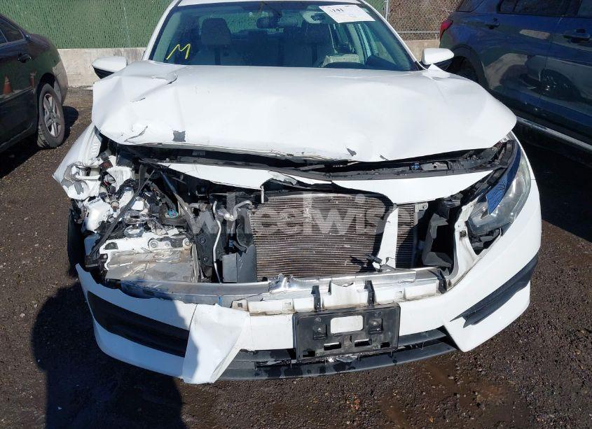 Photo 6 of 2017 Honda Civic LX (VIN 19XFC2F5XHE209197)