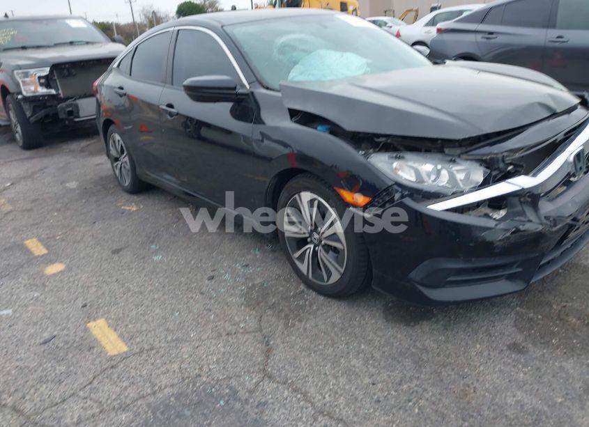 2017 Honda Civic LX (VIN 19XFC2F5XHE210799) main photo