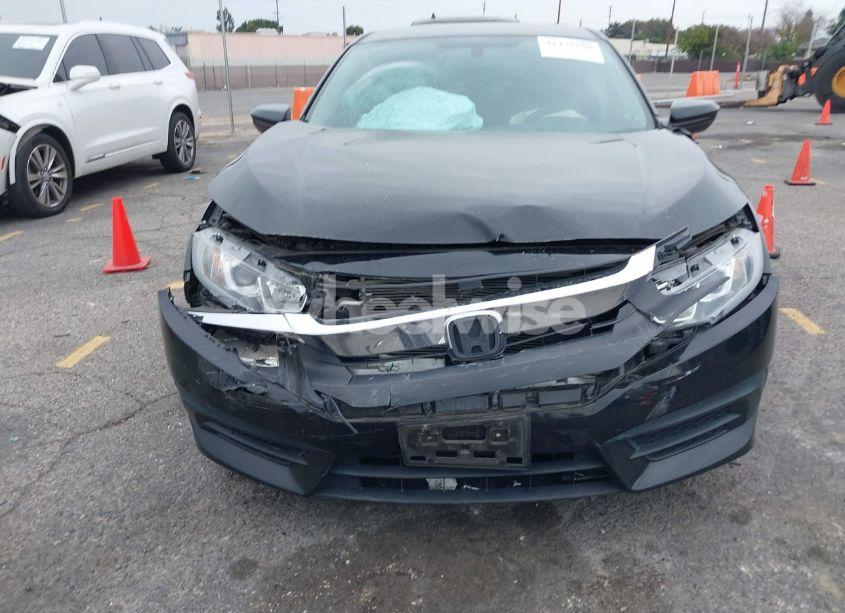Photo 12 of 2017 Honda Civic LX (VIN 19XFC2F5XHE210799)