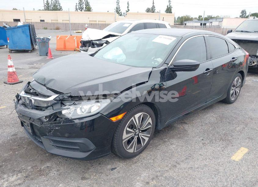 Photo 2 of 2017 Honda Civic LX (VIN 19XFC2F5XHE210799)