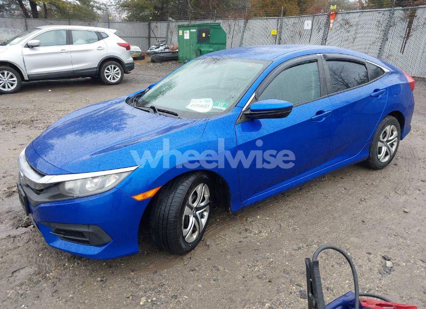Photo 2 of 2017 Honda Civic LX (VIN 19XFC2F5XHE222273)