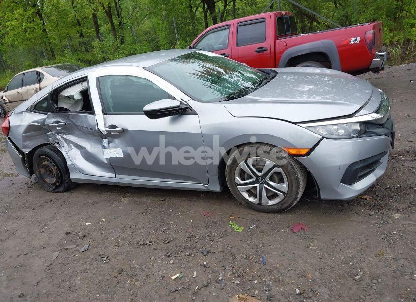 Photo 12 of 2017 Honda Civic LX (VIN 19XFC2F5XHE226436)