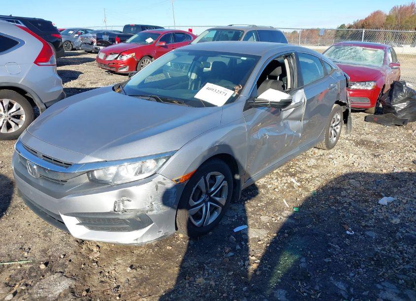 Photo 2 of 2018 Honda Civic LX (VIN 19XFC2F5XJE008695)