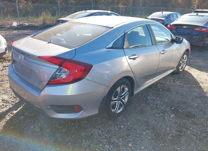 Photo 4 of 2018 Honda Civic LX (VIN 19XFC2F5XJE008695)
