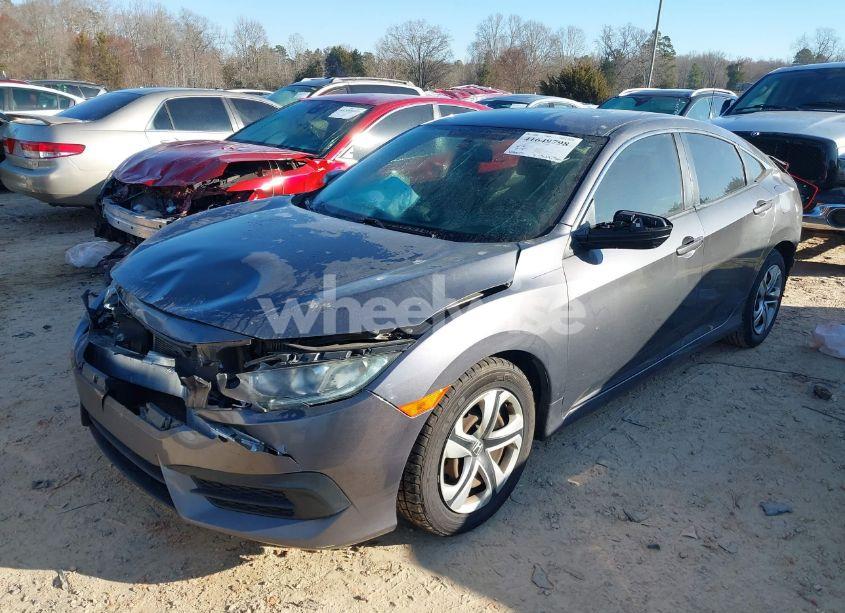Photo 2 of 2018 Honda Civic LX (VIN 19XFC2F5XJE021480)