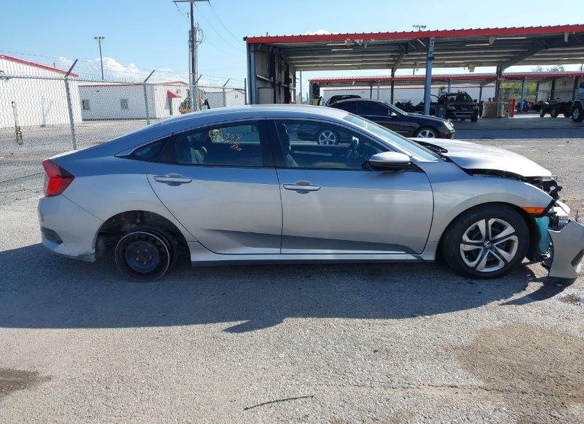 Photo 13 of 2018 Honda Civic LX (VIN 19XFC2F5XJE041437)