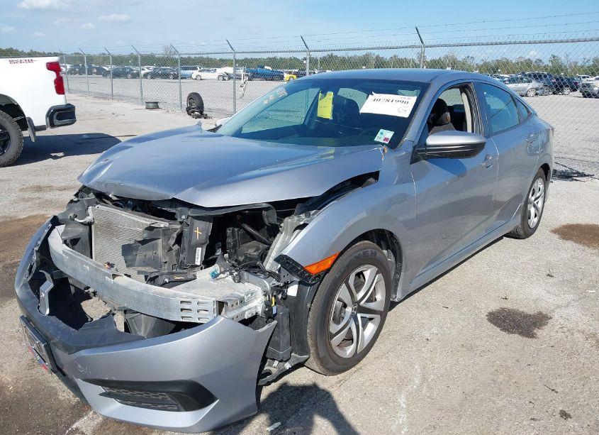 Photo 2 of 2018 Honda Civic LX (VIN 19XFC2F5XJE041437)