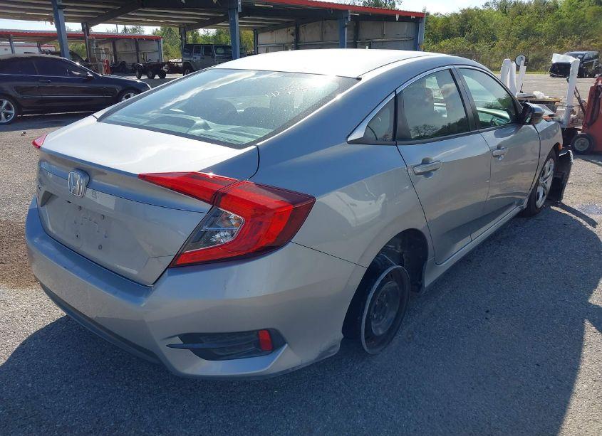 Photo 4 of 2018 Honda Civic LX (VIN 19XFC2F5XJE041437)