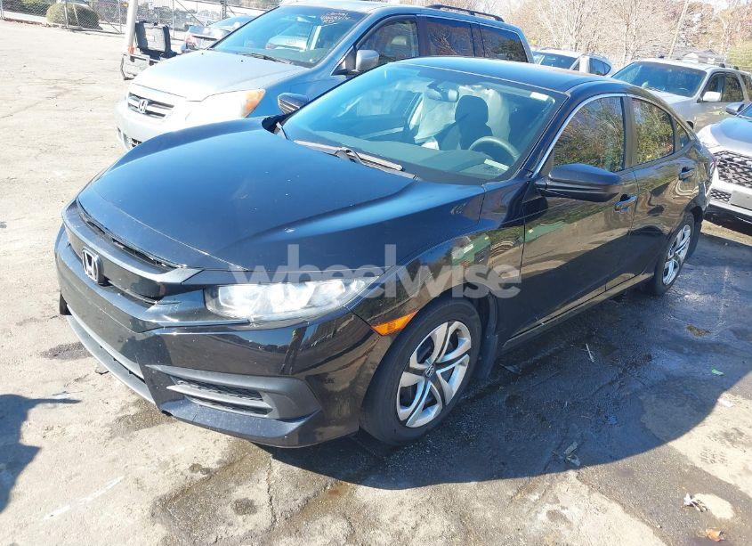 Photo 2 of 2018 Honda Civic LX (VIN 19XFC2F5XJE041454)