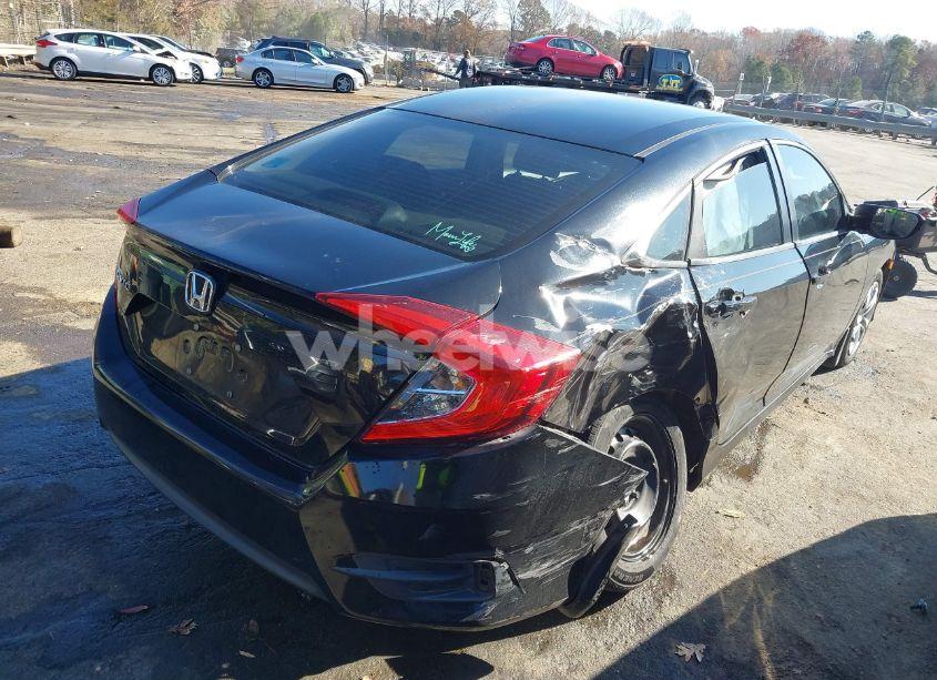 Photo 4 of 2018 Honda Civic LX (VIN 19XFC2F5XJE041454)