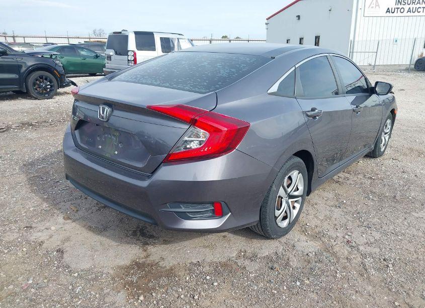 Photo 4 of 2018 Honda Civic LX (VIN 19XFC2F5XJE043785)