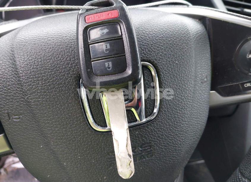 Photo 11 of 2018 Honda Civic LX (VIN 19XFC2F5XJE203969)