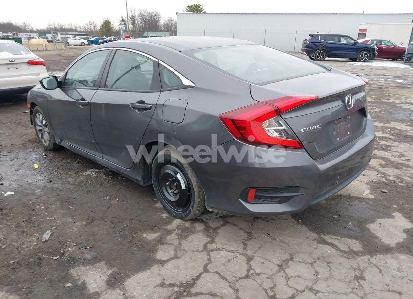 Photo 3 of 2018 Honda Civic LX (VIN 19XFC2F5XJE203969)