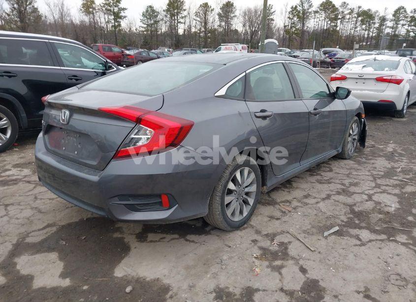 Photo 4 of 2018 Honda Civic LX (VIN 19XFC2F5XJE203969)
