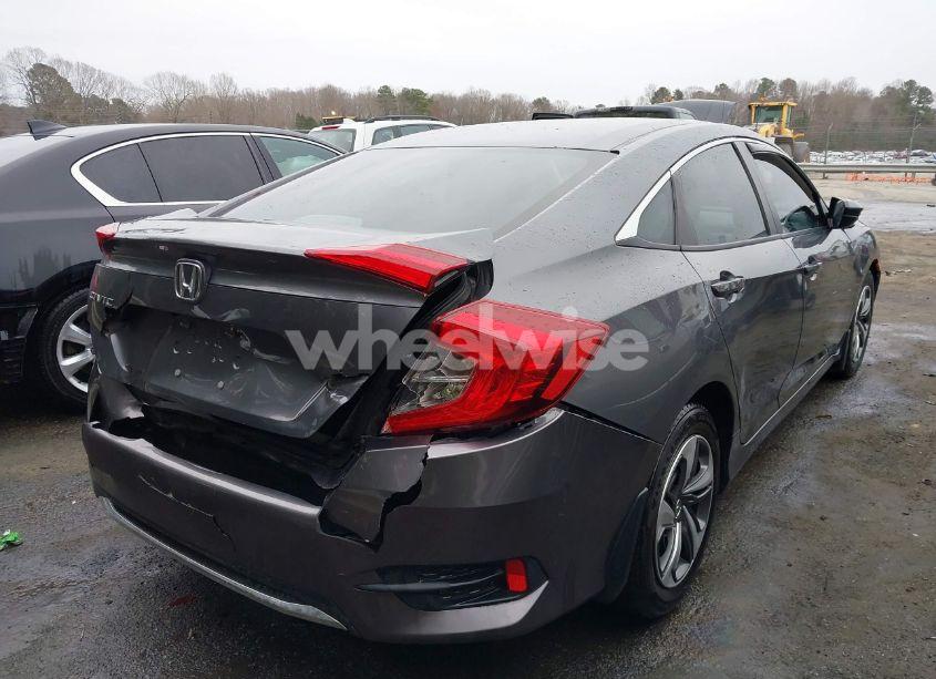 Photo 4 of 2019 Honda Civic LX (VIN 19XFC2F60KE027475)