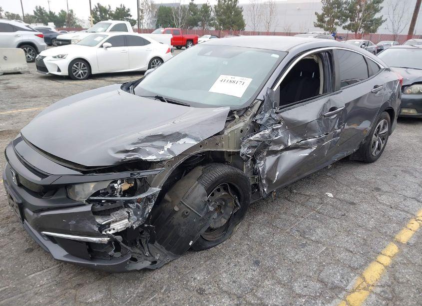 Photo 2 of 2019 Honda Civic LX (VIN 19XFC2F60KE201254)