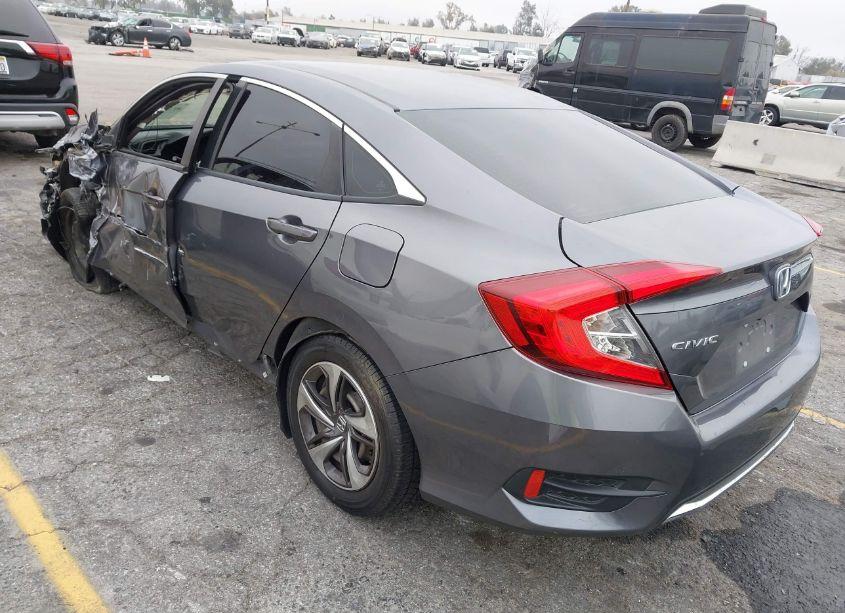 Photo 3 of 2019 Honda Civic LX (VIN 19XFC2F60KE201254)
